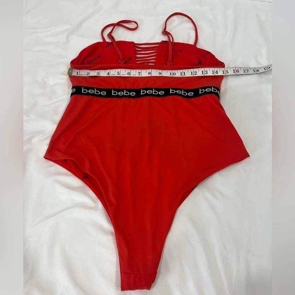 Bebe blood orange red swimsuit black band with logo size XL